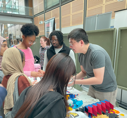  Tuo Zhao and Shixi Zang volunteer at Young Women's Conference